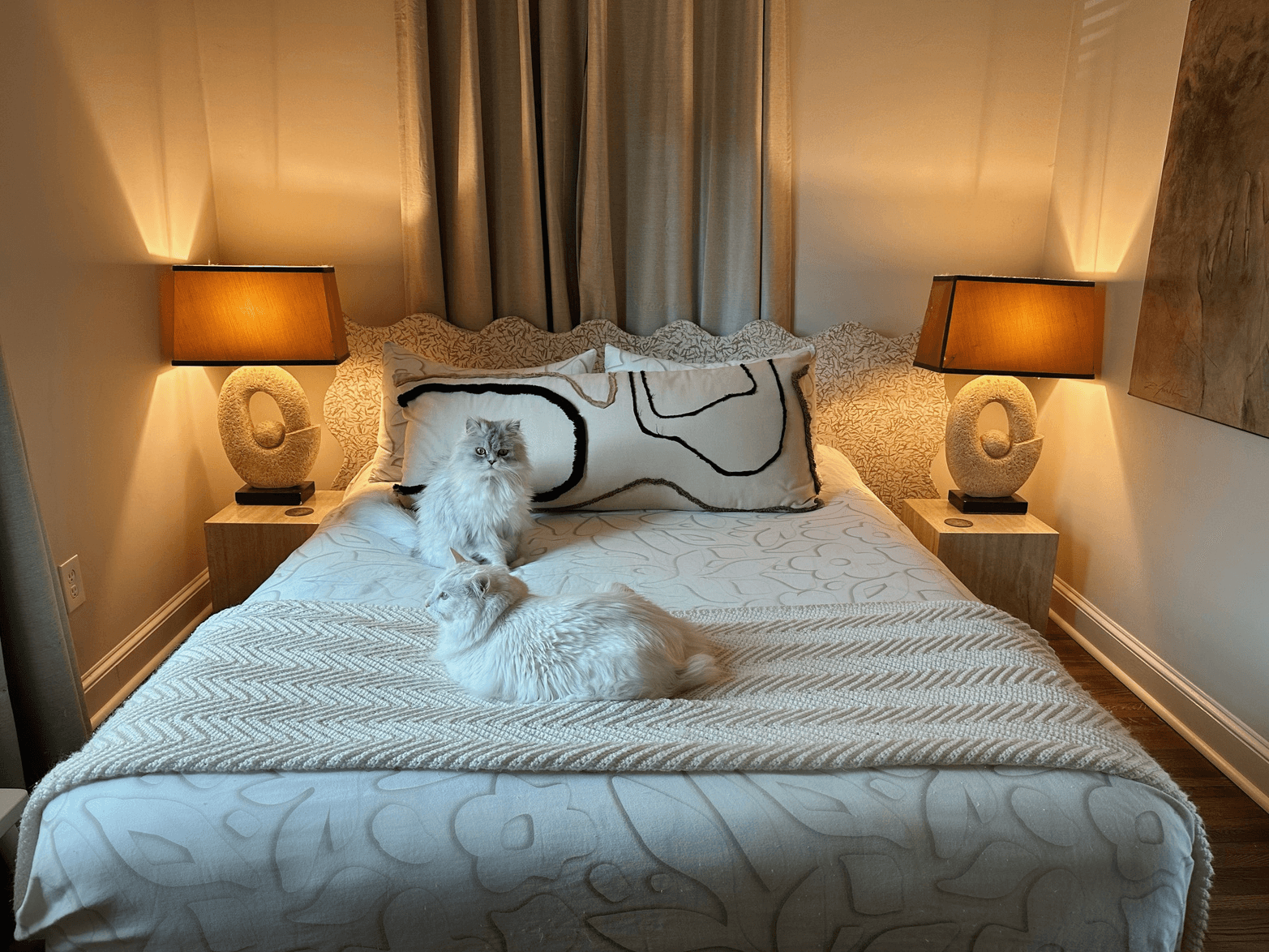 Bedroom — sculptural lamps, custom headboard